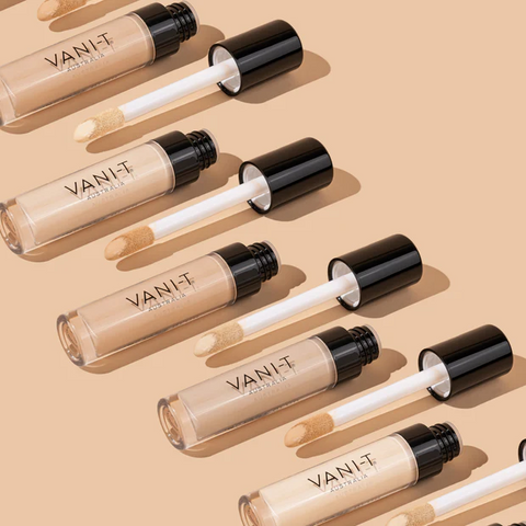 Open tubes of Vani-T Instant Blur HD Concealer showing shades