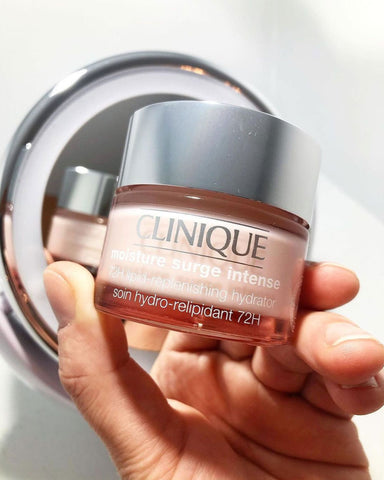 Clinique Moisture Surge Intense jar held in hand