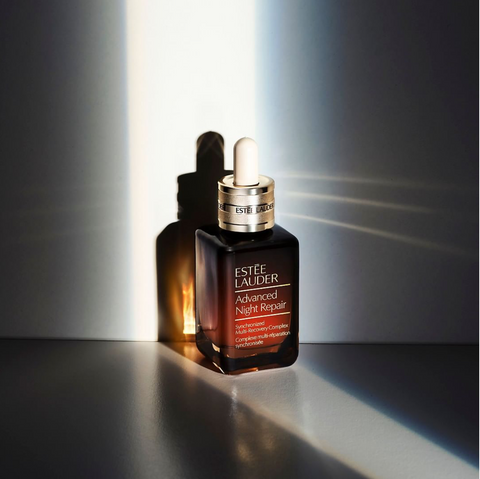 Estee lauder advanced night repair serum bottle in a ray of light