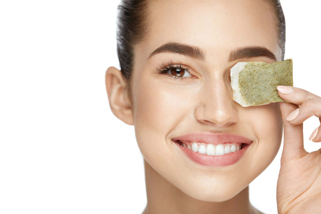 Woman using Green Tea Extract for Skin