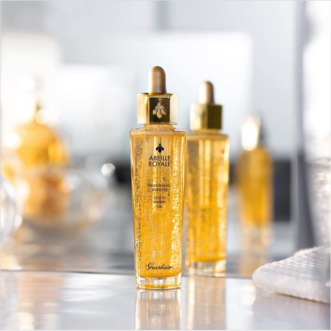 Guerlain Youth Watery Oil image against mirror