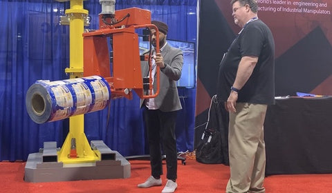 Photo of two men at the ATX West show in USA