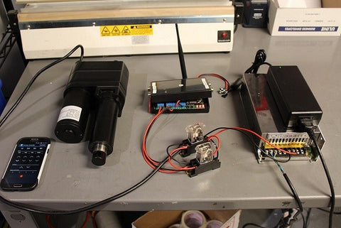 Photo of PA-35 Wi-Fi control box, PA-17 linear actuator,  mechanical relays, power supply, and power adapter