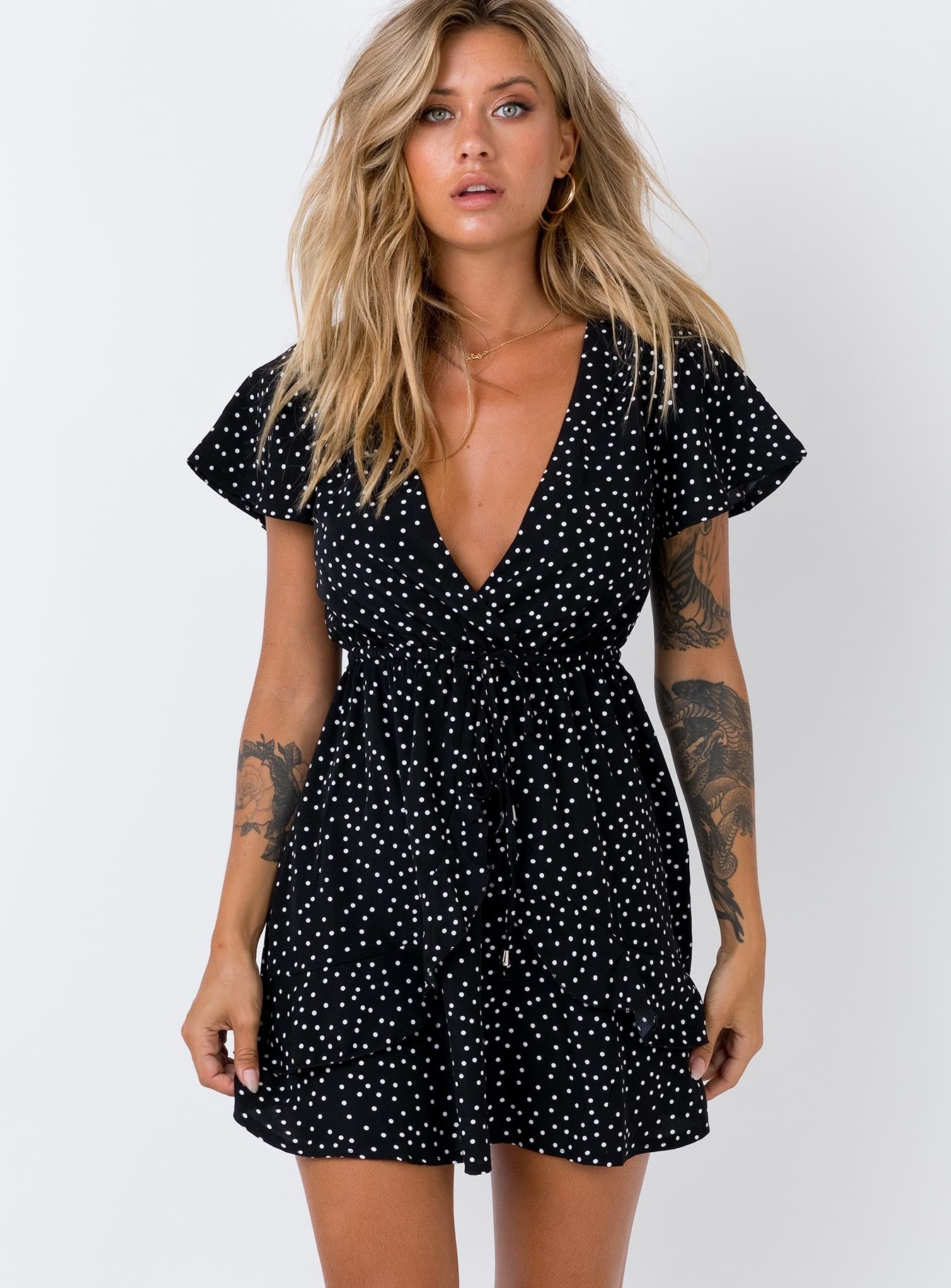 black polka dot mini dress