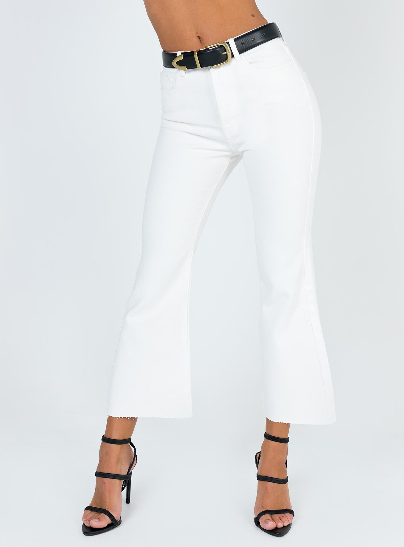 white flare ankle jeans