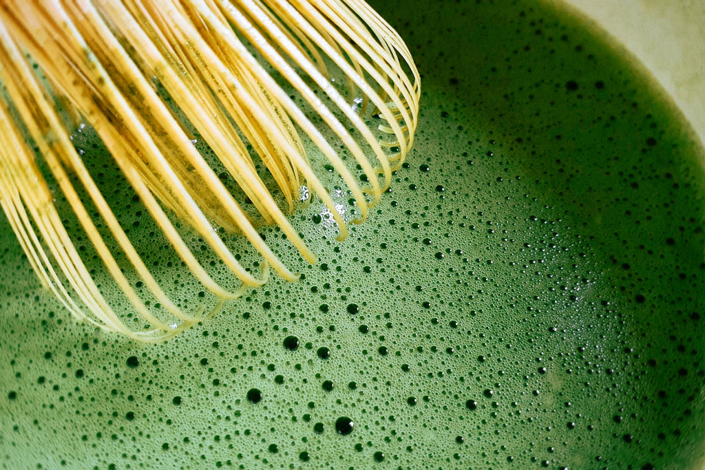 superfood science close up of whisked matcha green tea 