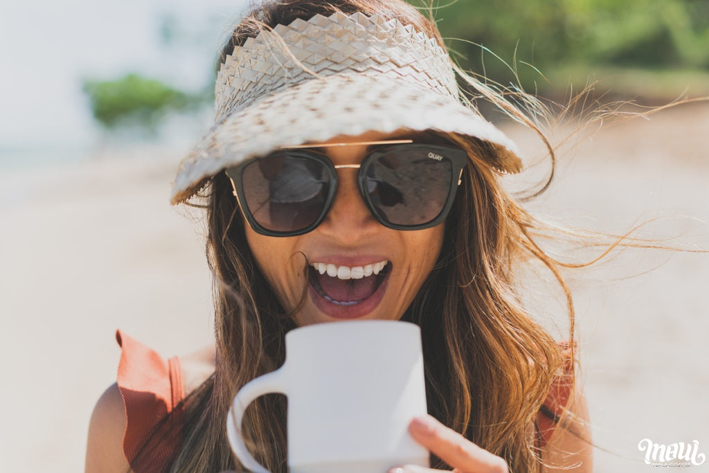 happy woman with Hawaii coffee