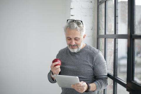 Man eating apple