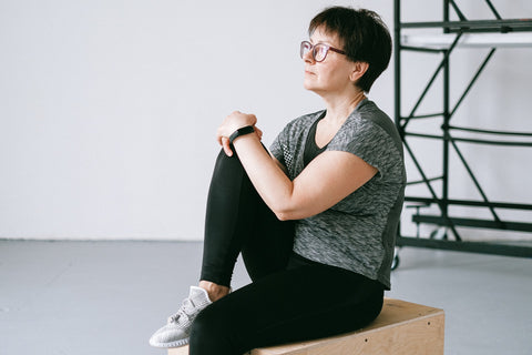 Woman stretching before exercise