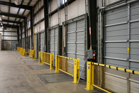 Warehouse dock doors and levelers are protected by safety gates