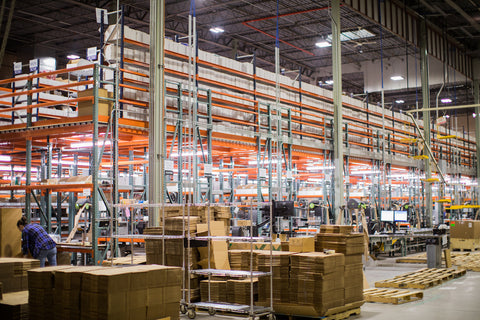 Pallets of books and art sit on shelves at the Deseret Book warehouse