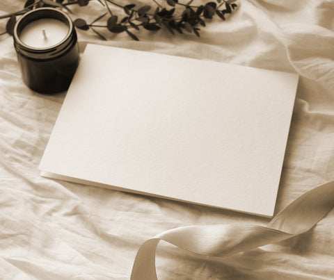 blank page with candle
