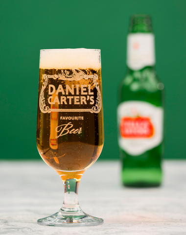 engraved glass with beer