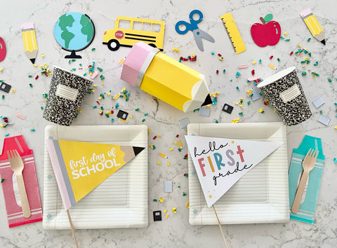 back to school party table setting featuring DIY printable pennant flag