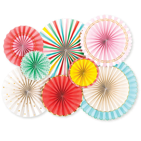 rainbow colored paper fans for a party backdrop