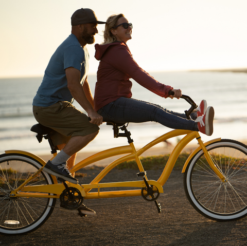 tandem bicycle beach biking couple riding bikes