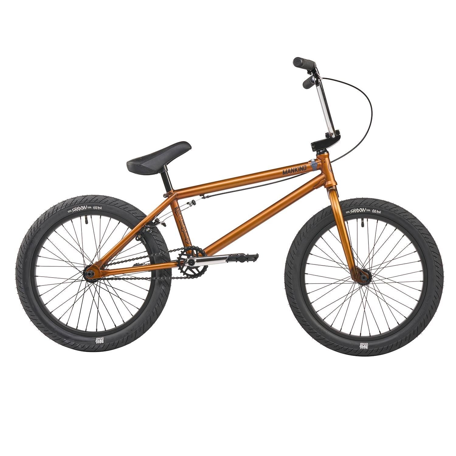 An image of Mankind Libertad BMX Bike Semi Matte Trans Gold BMX Bikes