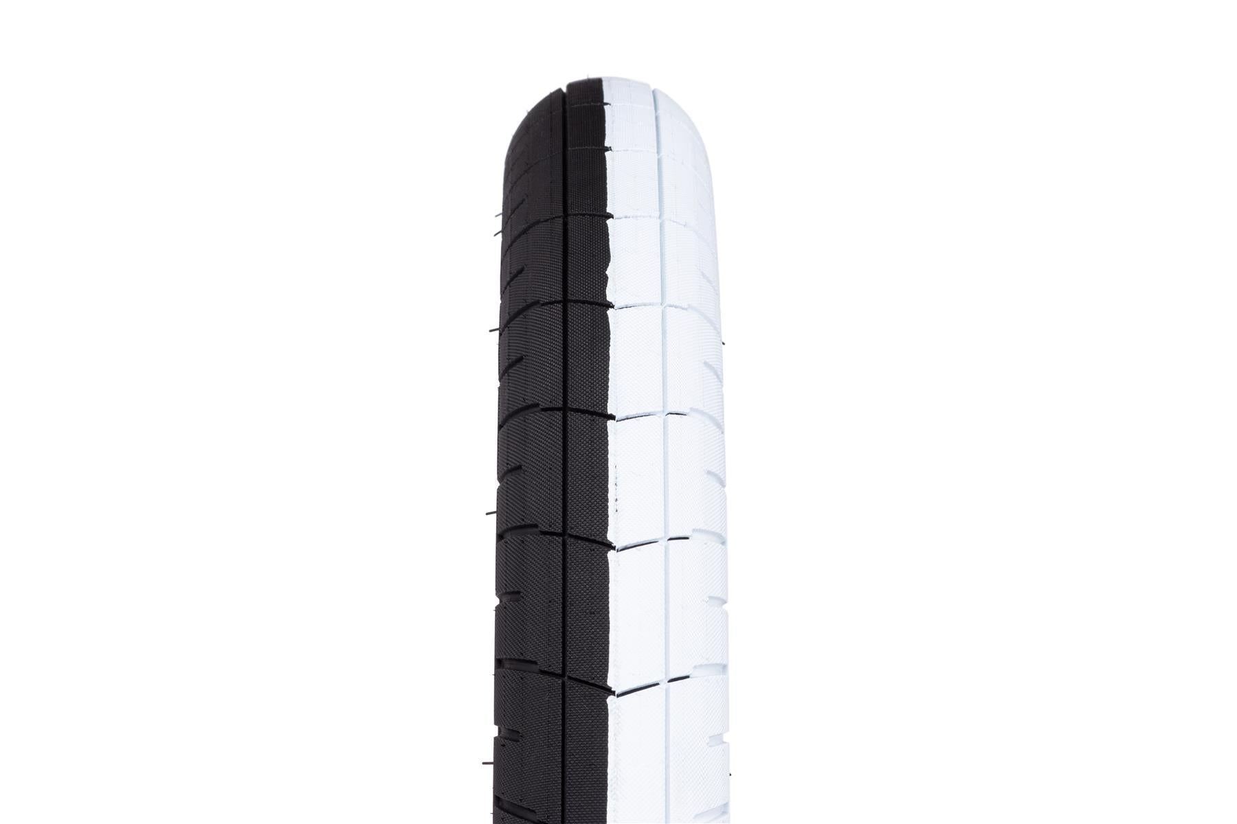 An image of Wethepeople 60 PSI Activate Tyre Black and White Split / 2.35" BMX Tyres