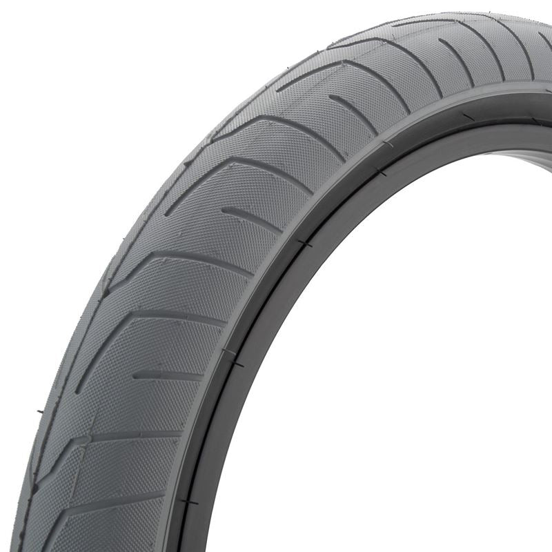 An image of Kink Sever Tyre Grey and Black Wall / 2.4" BMX Tyres