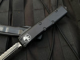 Microtech UTX-85 D/E Black Aluminum Body w/ Black Full Serrated Blade (3.1”) 232-3T