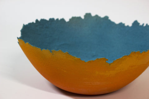 large orange glass bowl