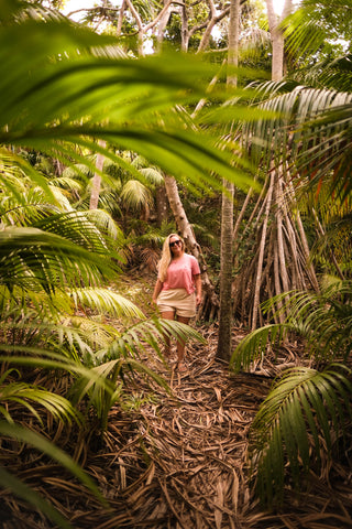 Sadie walking through palm jungle in Lord Howe