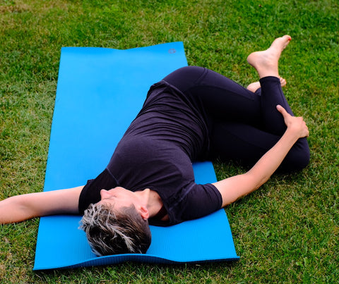 Yoga Übung für Läufer Spinal Twist