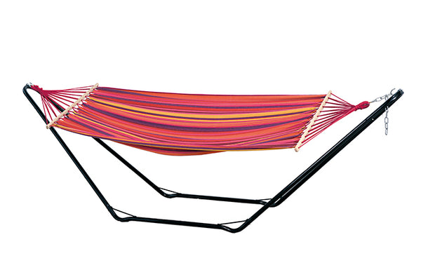 A striped red, pink, purple and yellow hammock on a metal stand