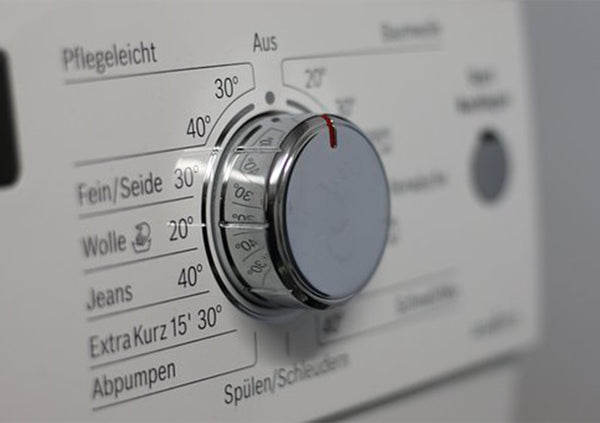 A washing machine that is turned off.