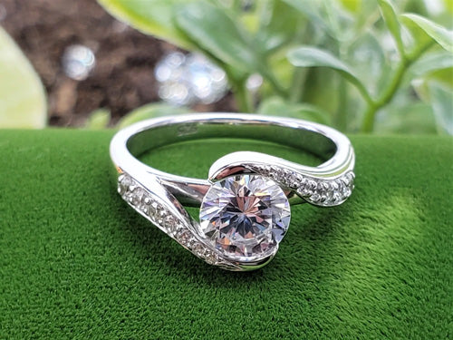 A twisted white gold diamond ring