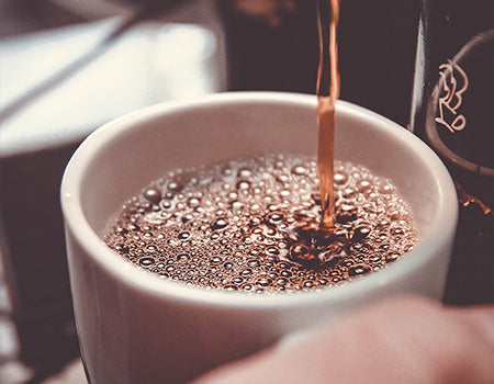 An espresso shot in a cup