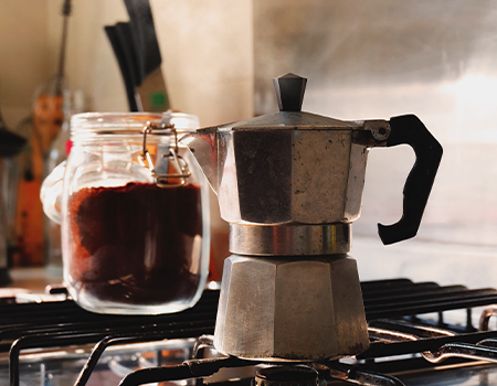 Moka Pot coffee maker kept on the stovetop