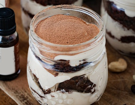 Layered Lady Finger Biscuits with Mascarpone cheese and icing sugar spread