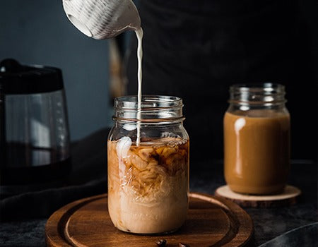 Adding milk to the coffee & cream mixture