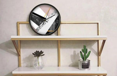 A wall clock with geometric pattern on its dial