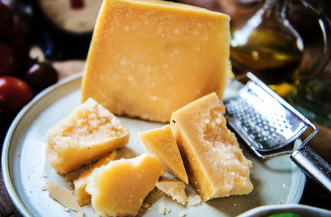 A delectable plate of cheeses.