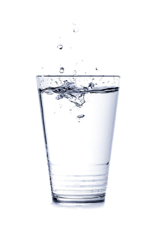 A clear glass of water, for AutoBrush