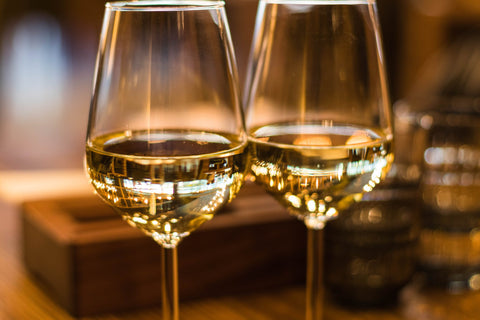 Two glasses of white wine choices for Valentine's Day.