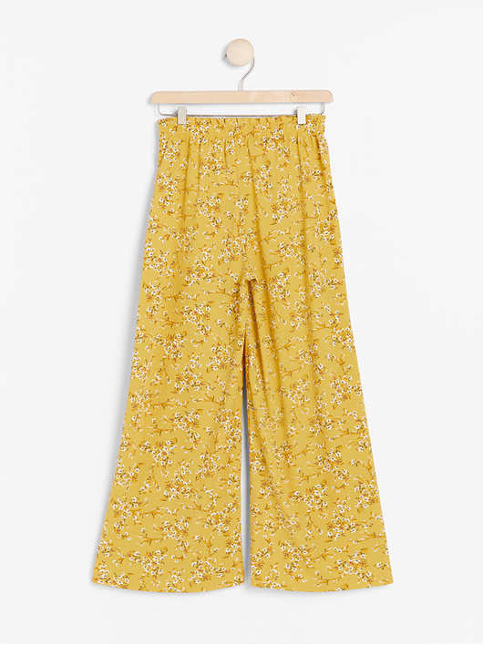 Emuler Bekræftelse forbrydelse Wide gule bukser med blomster mønster – Lindex Danmark
