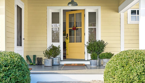 Yellow painted House and front door