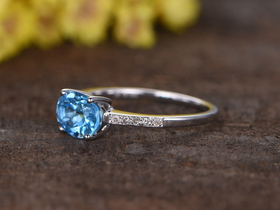 1.25 Carat Oval Sky Blue Topaz and Diamond Unique Engagement Ring in W ...