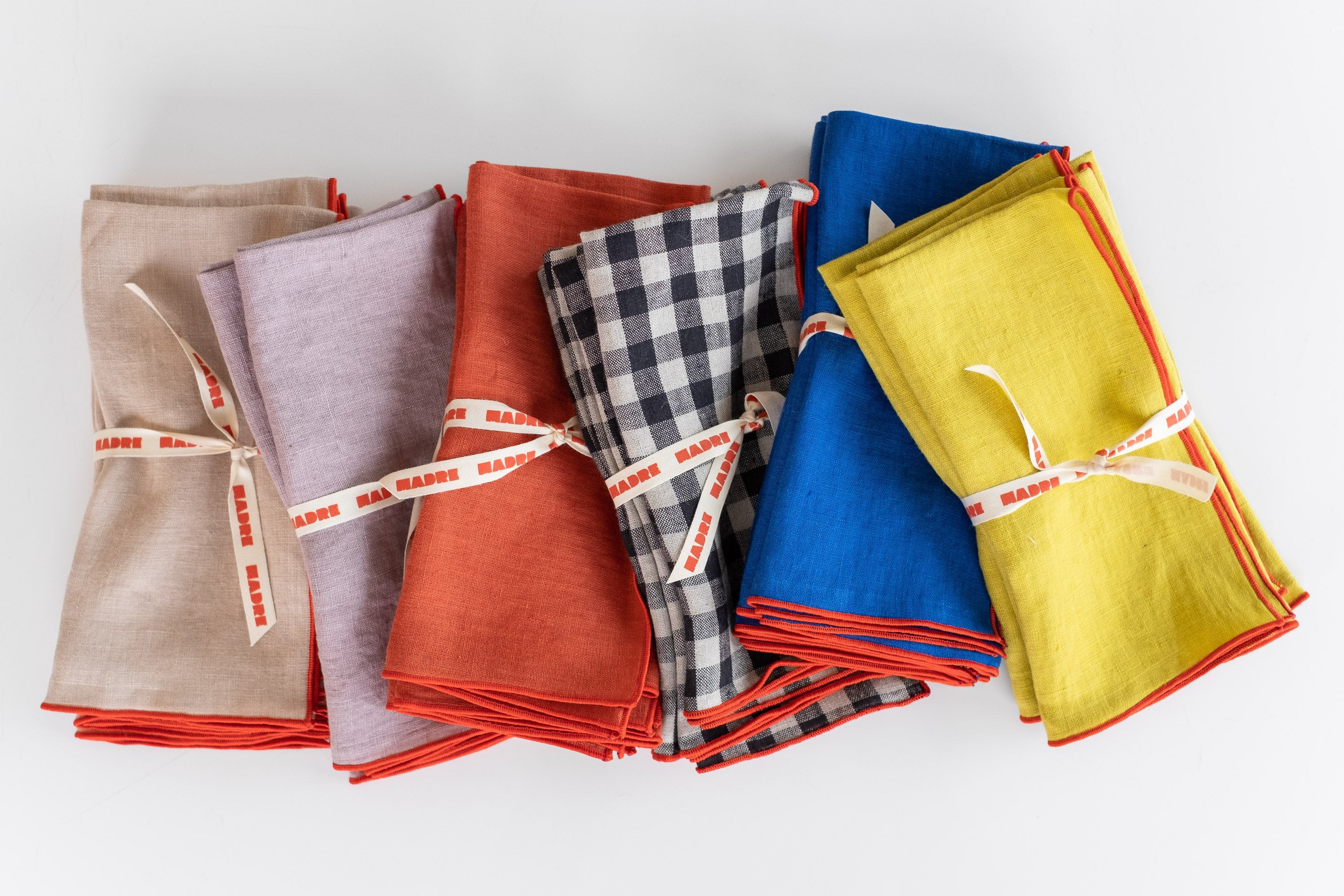 https://cdn.shopify.com/s/files/1/0063/2681/2770/collections/MADRE_LINEN_NAPKINS.jpg?v=1616193225