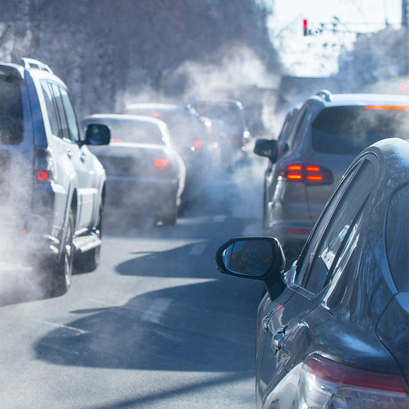 Cars Stuck In Traffic With Pollution in Air