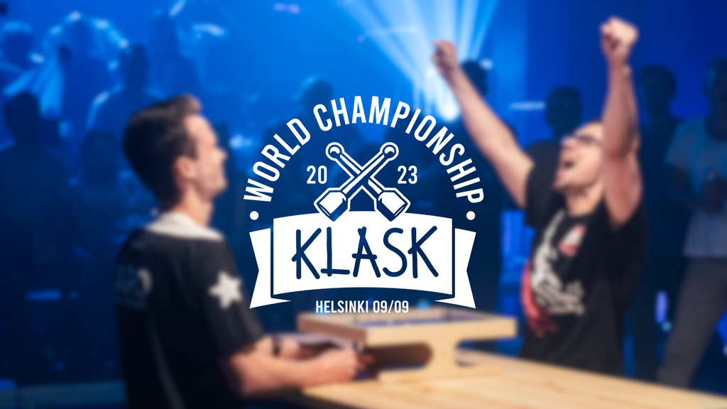 The official 2023 KLASK World Championship logo in white in the foreground. The background image is of the newly crowned KLASK World Champion celebrating their win in front of the onlooking crowd