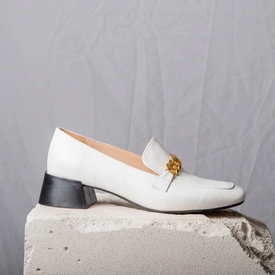 white and gold loafers