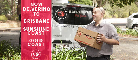 Delivery man and van bringing Happy Paws Pet Food