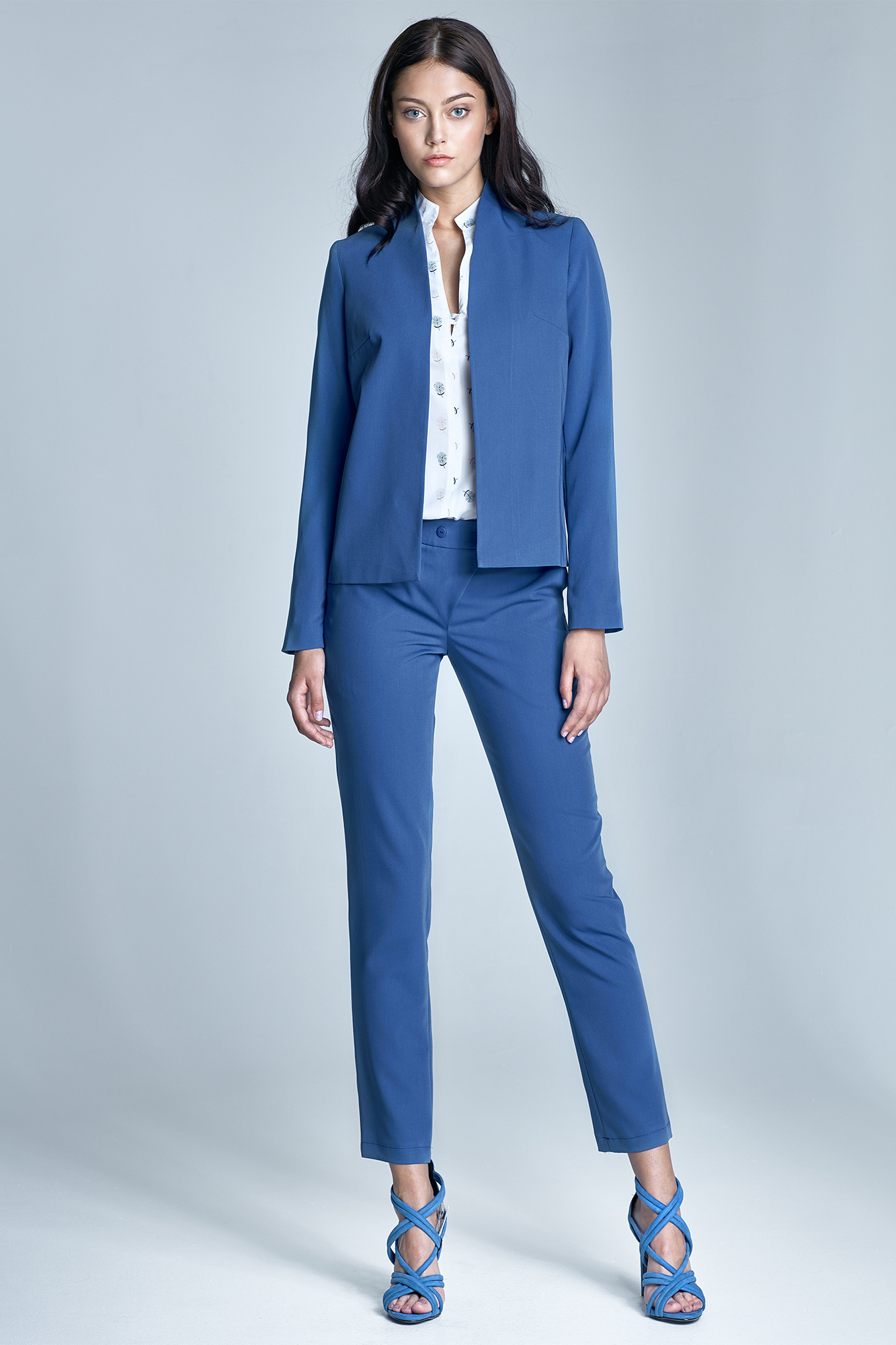 Blue pantsuit and flowing blouse set