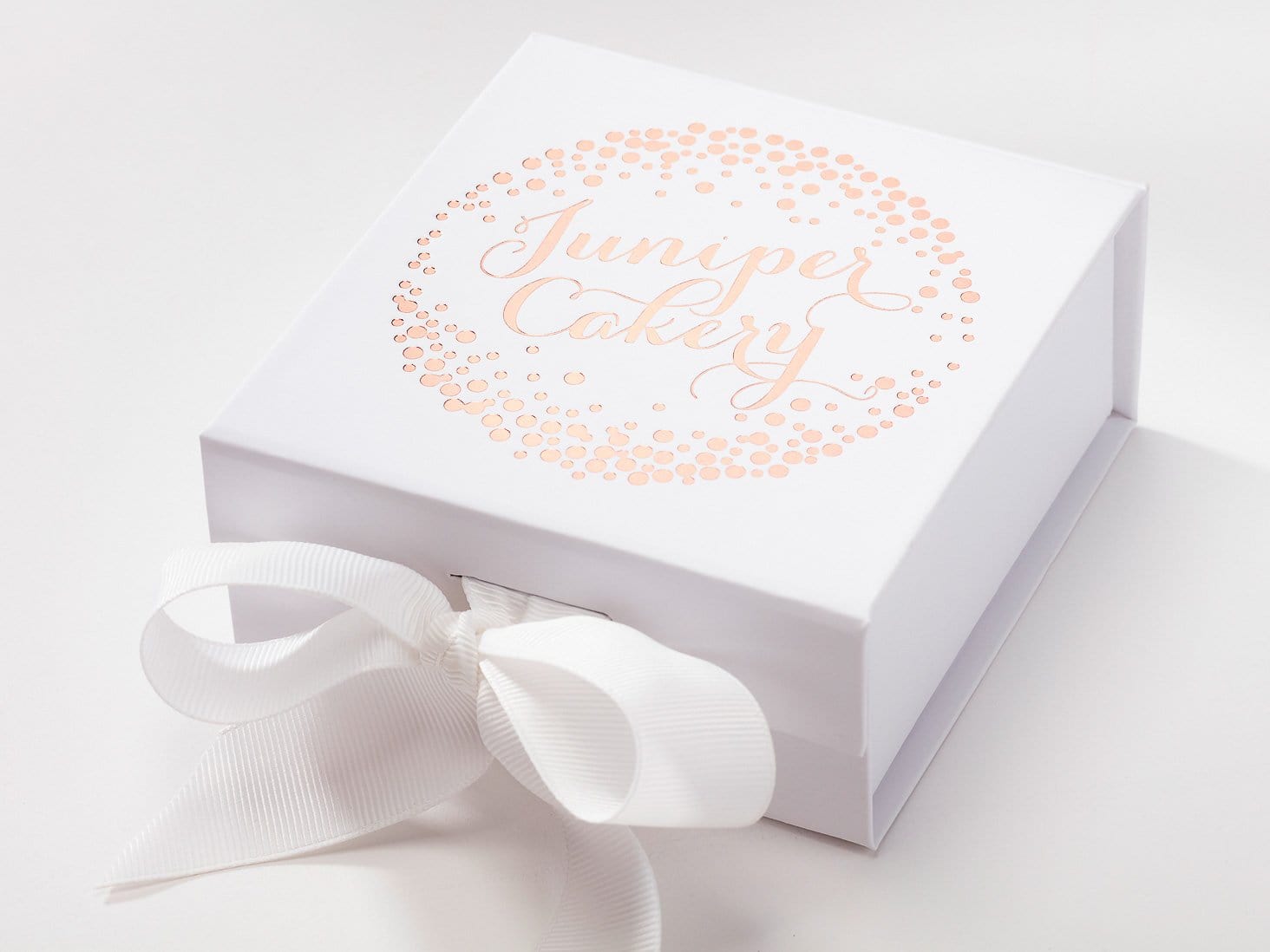 Wholesale White Small Folding Gift Boxes with Fixed Ribbon | Foldabox