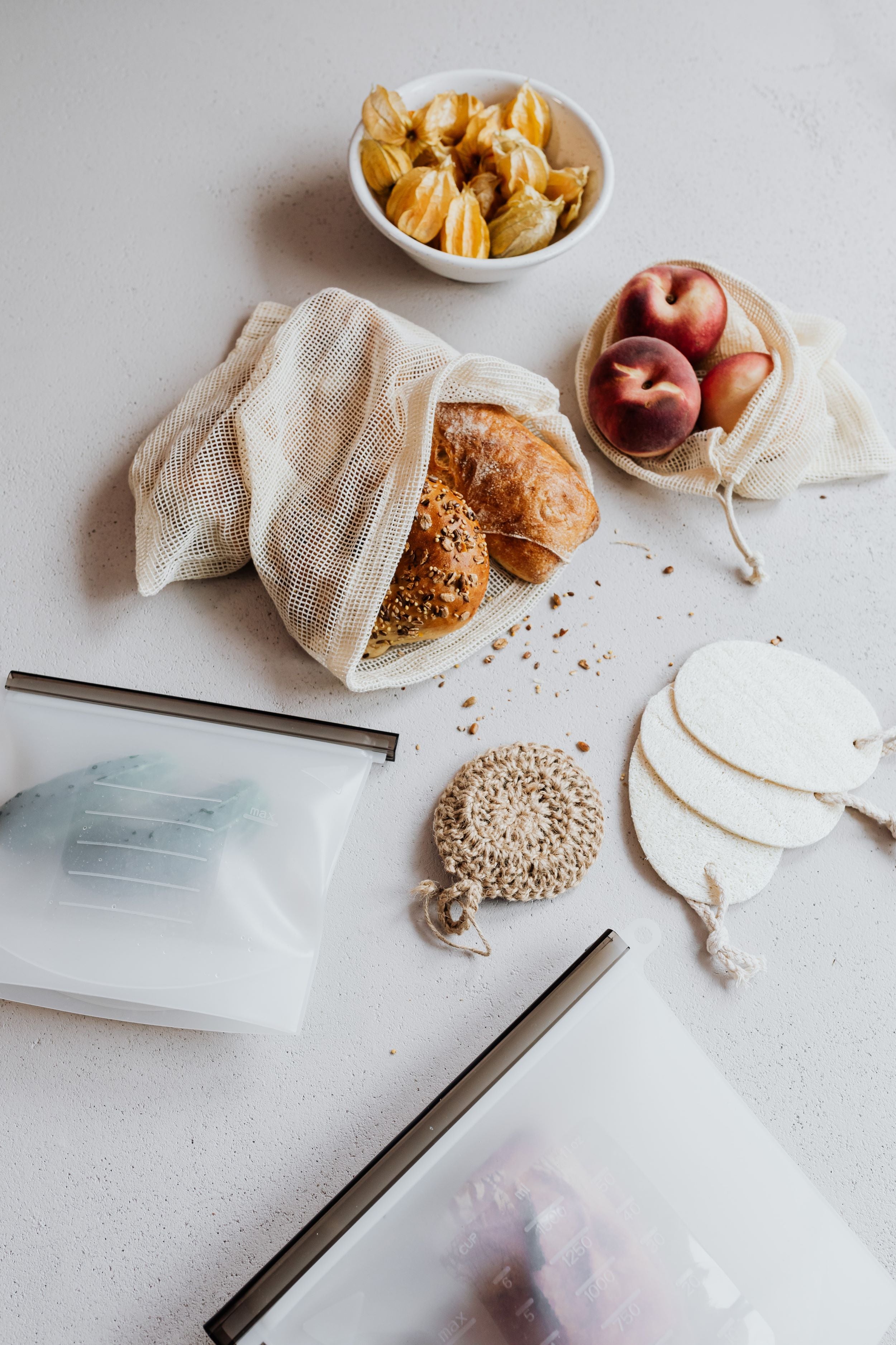 Bread and fruit in reusable bags