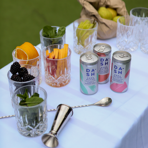 Table with Dash soda water and pots of fruit